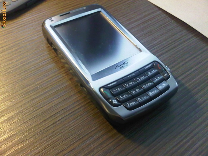 TELEFON MIO A 702 / SCHIMB cu laptop + diferenta foto mare