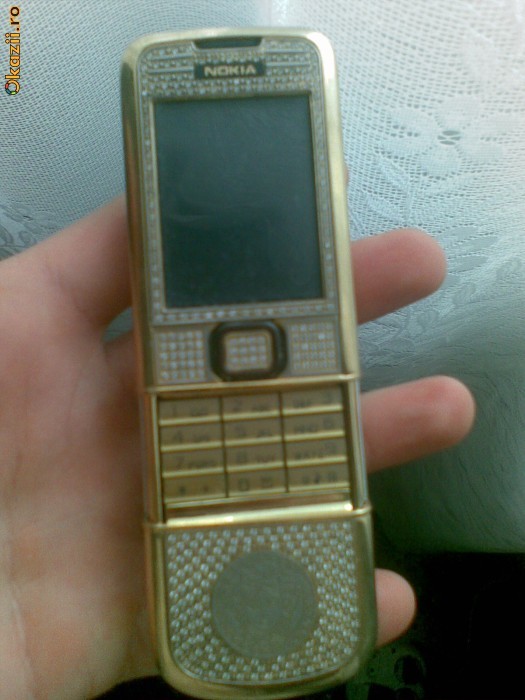 vand nokia 8800 gold arte carbon foto mare